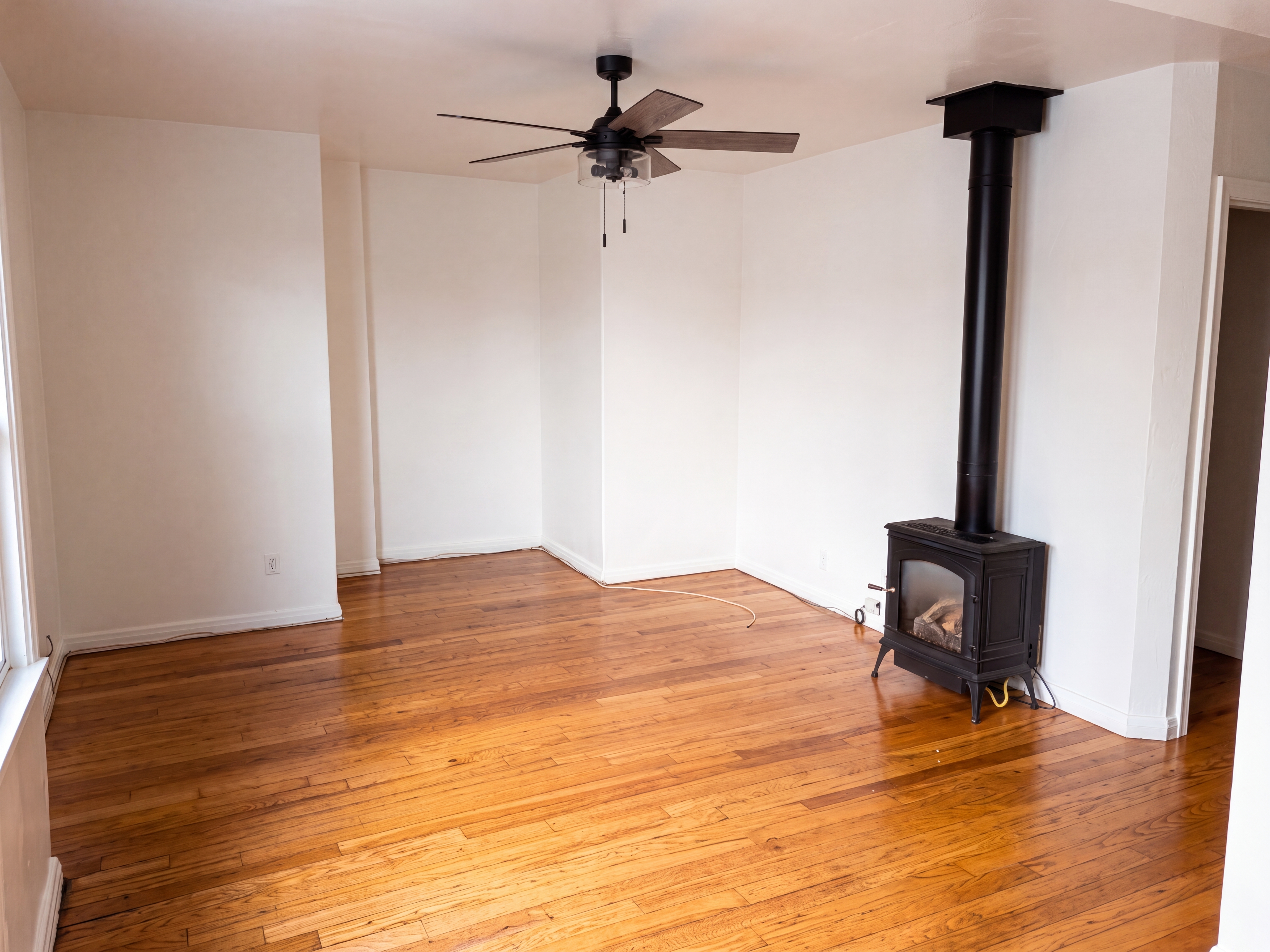 Studio unit living area with wood stove